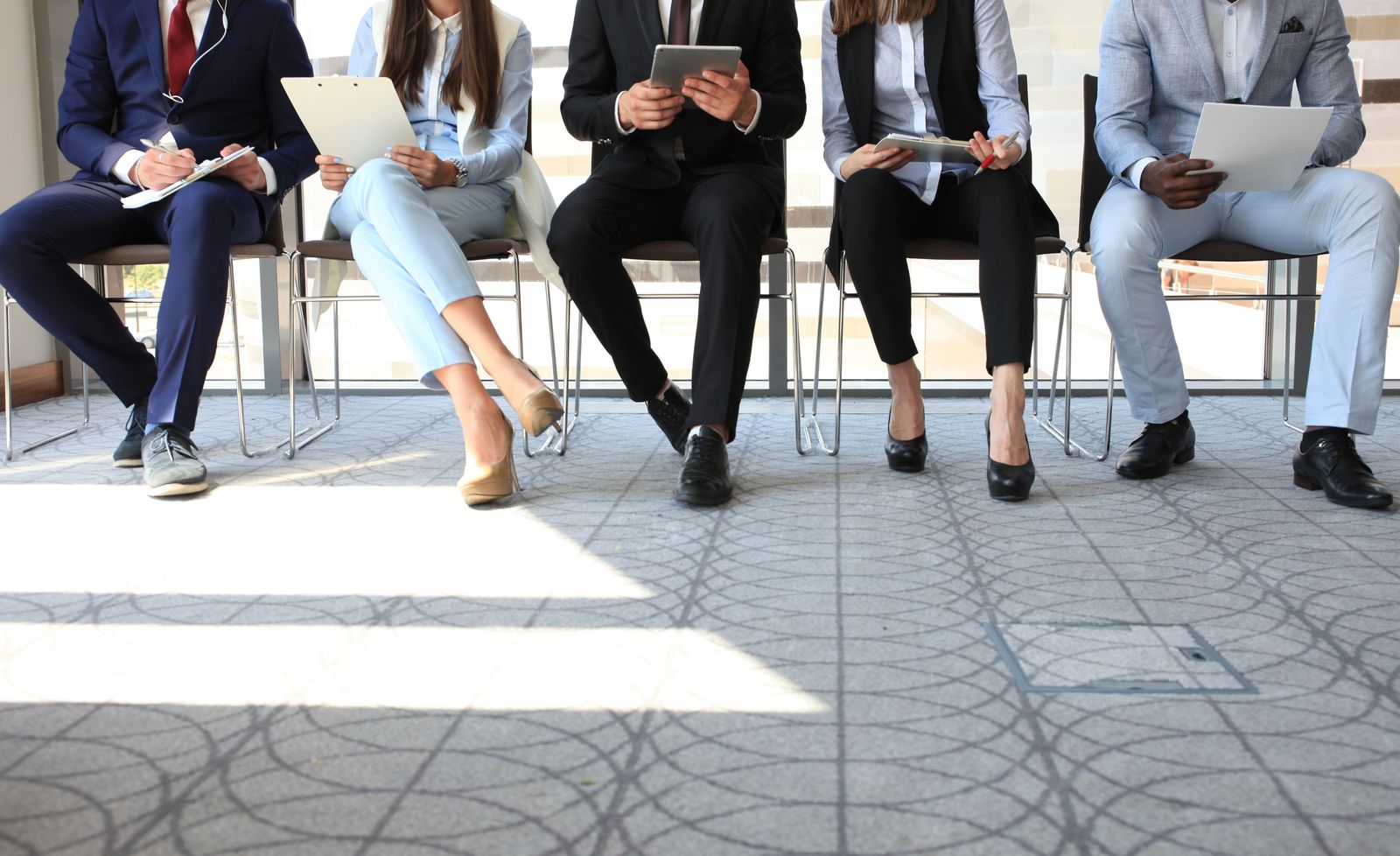 hiring-process-applicants-waiting-feet